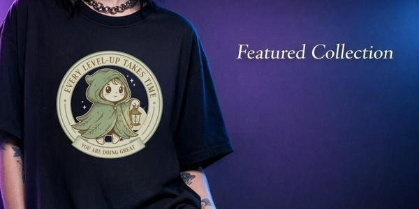 Featured tee: black with circular badge of hooded figure and lantern, Every level up takes time; You are doing great.