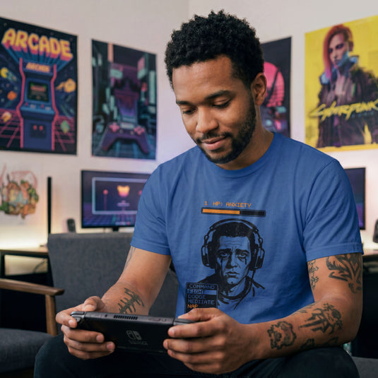 Translation missing: en.Royal t-shirt with a tired gamer graphic, an orange 1 HP Anxiety bar, and an RPG menu selecting the NAP option