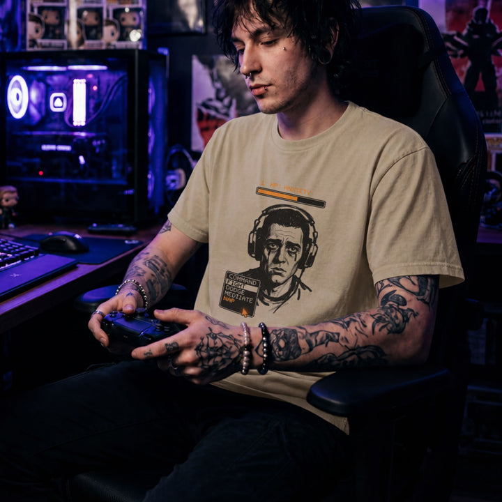 Translation missing: en.Sand t-shirt with a tired gamer graphic, an orange 1 HP Anxiety bar, and an RPG menu selecting the NAP option
