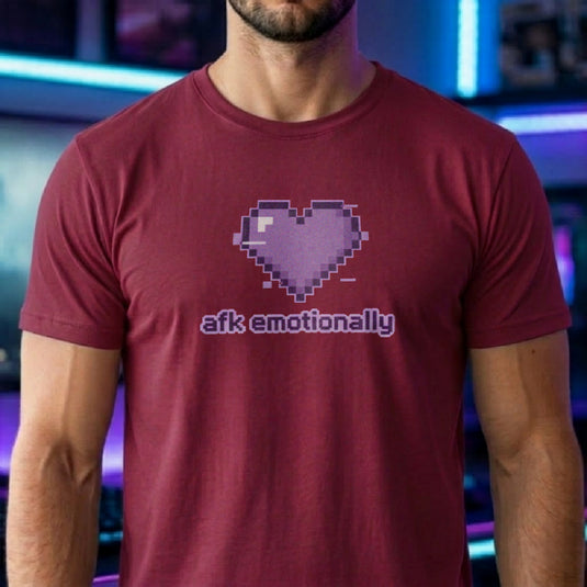 Translation missing: en.Cardinal red t-shirt featuring a purple pixel art glitch heart with lowercase text reading afk emotionally