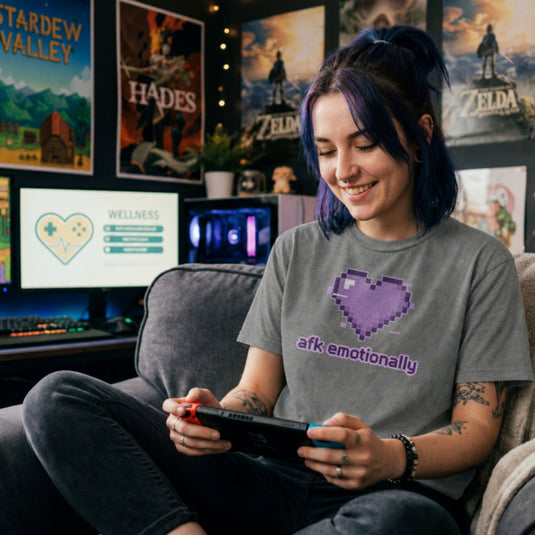 Translation missing: en.Alt n Vibe graphite heather t-shirt featuring a purple pixel art glitch heart with lowercase text reading afk emotionally