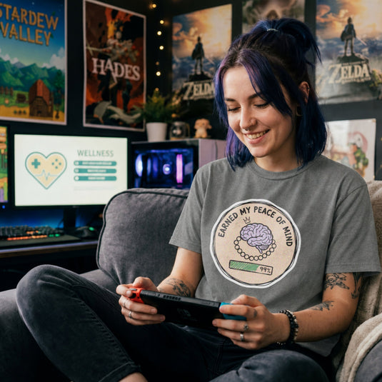 Translation missing: en.Graphite heather cotton tee with brain illustration coin graphic and text "EARNED MY PEACE OF MIND"