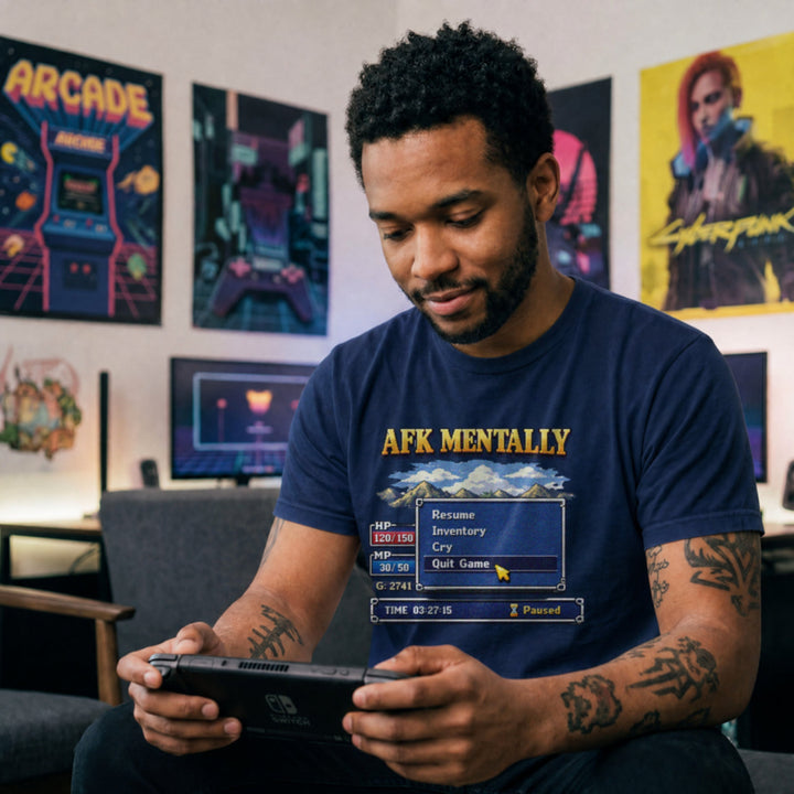 Translation missing: en.Navy Maroon tee with gold AFK Mentally text over a pixel art retro RPG menu box with a cursor hovering on Quit Game