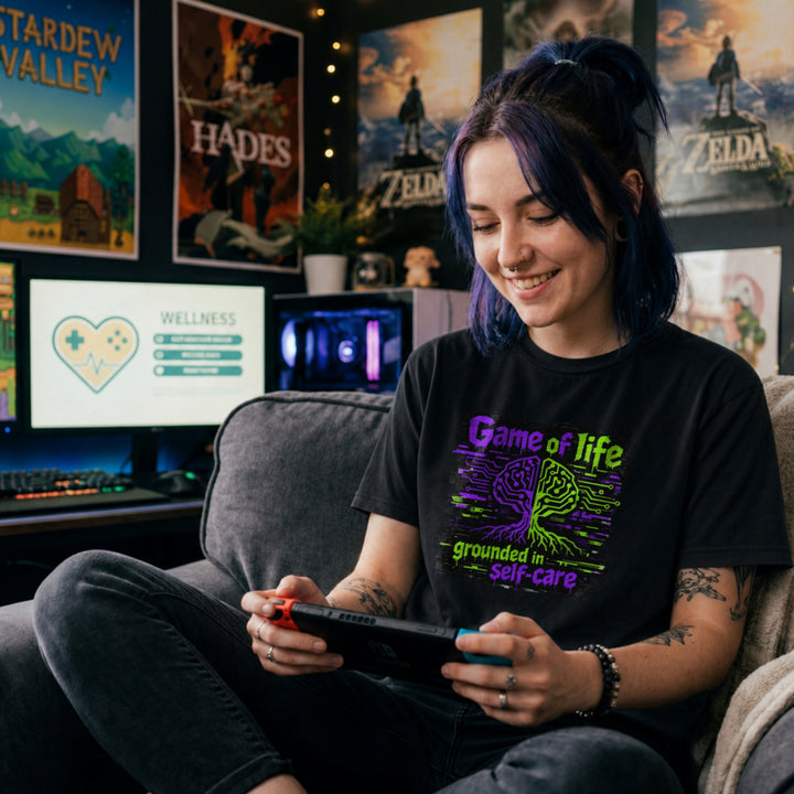 Translation missing: en.Black t-shirt with Game of life grounded in self-care neon graphic showing a circuit board brain tree design