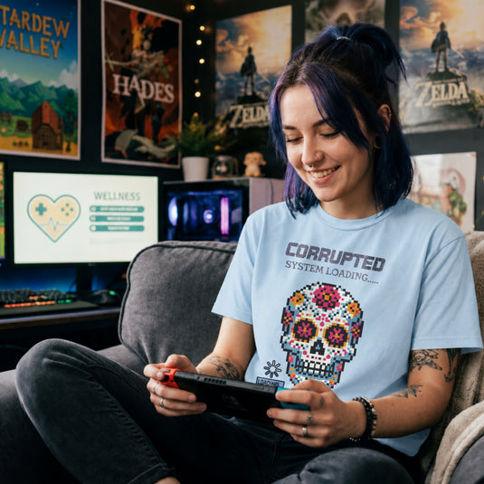 Translation missing: en.Light blue t-shirt graphic with pixel art sugar skull reading Corrupted System Loading and a spinning load icon