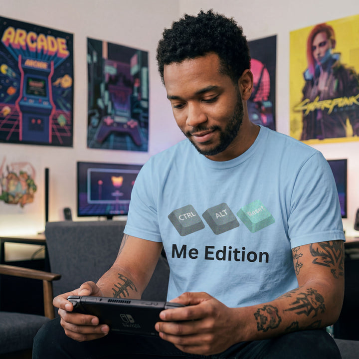 Translation missing: en.Light blue t-shirt graphic with Ctrl, Alt, and Reset computer keyboard keys over text reading Me Edition