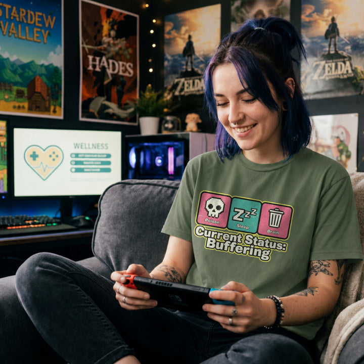 Translation missing: en.Military green Retro pixel art tee with Poison, Sleep, Brain icons and text reading Current Status Buffering for gamers