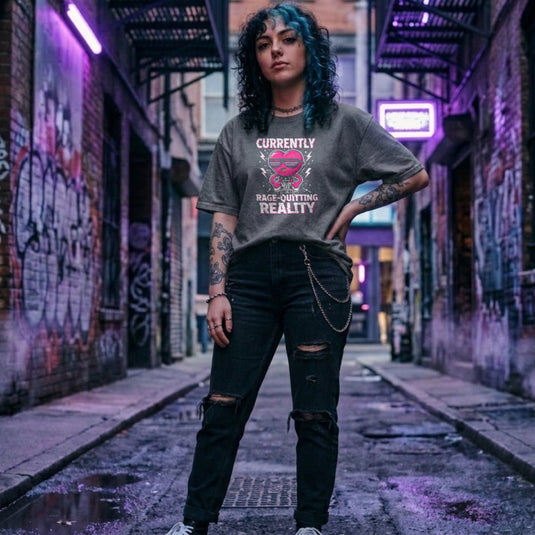 Translation missing: en.Graphite Heather tee with a pink heart cartoon wearing sunglasses, ripping a controller, and Rage-Quitting Reality text