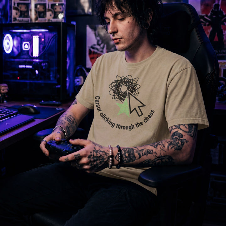 Translation missing: en.Sand tee with a large mouse cursor clicking a green star beneath a scribble, reading Cursor clicking through the chaos