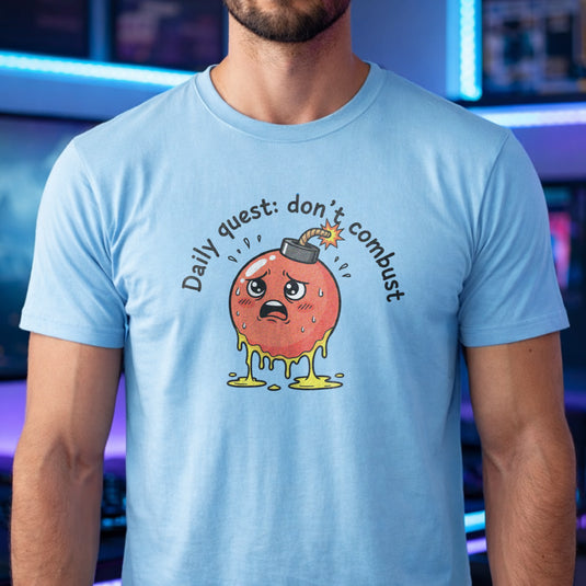 Translation missing: en.Light blue tee with cute sweating cartoon bomb graphic reading Daily quest: don't combust