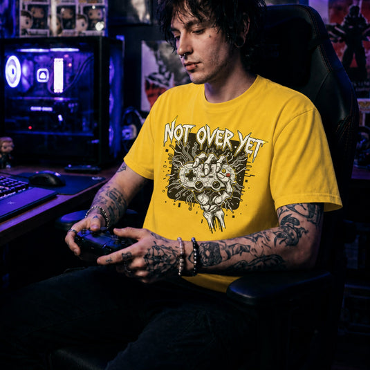 Translation missing: en.Daisy cotton tee with bone hand holding gamepad graphic text 'Not Over Yet'