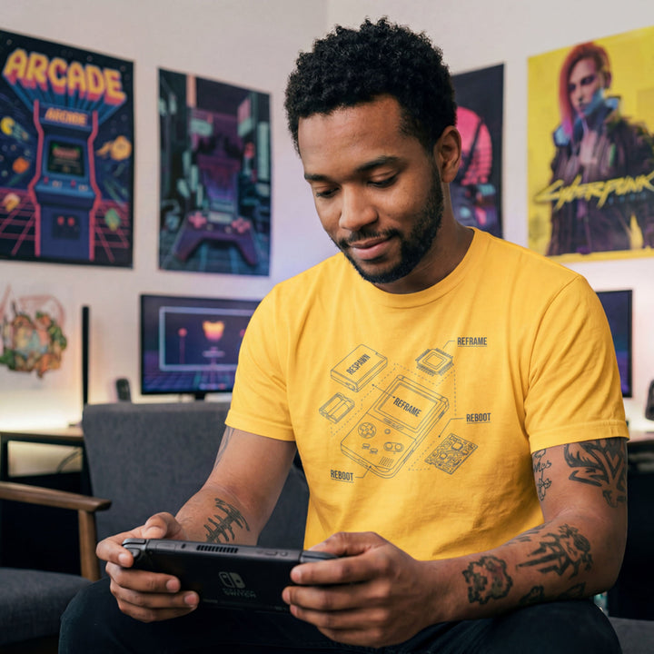 Translation missing: en.Daisy t-shirt with a blue retro handheld console blueprint graphic labeled Respawn, Reframe, and Reboot