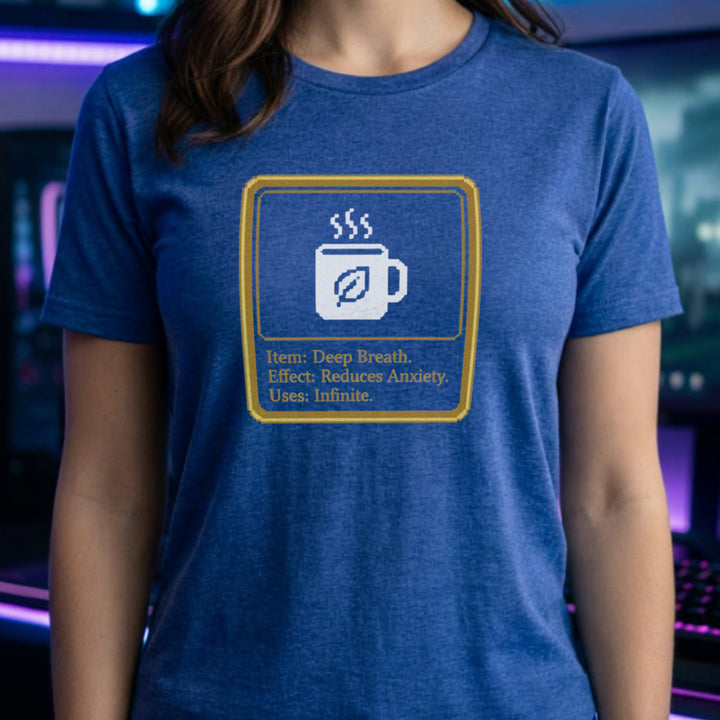 Translation missing: en.Heather royal shirt with a pixel art mug inside a gold box reading Item: Deep Breath, Effect: Reduces Anxiety, Uses: Infinite