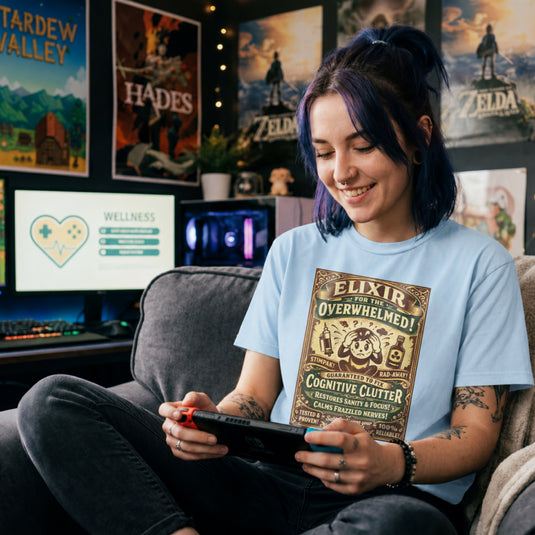 Translation missing: en.Light blue Vintage apothecary graphic shirt reading Elixir for the Overwhelmed with Fallout Stimpak and Rad-Away illustrations