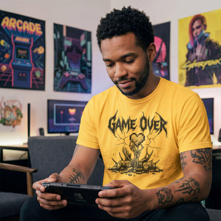 Translation missing: en.Daisy gamer t-shirt with heavy metal Game Over text, a skeleton hand holding a pixel heart, and controllers