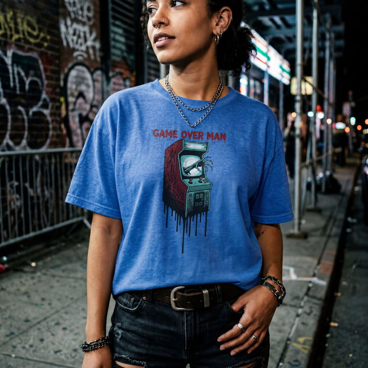Translation missing: en.Heather royal shirt graphic showing a monster hand clawing out of a melting retro arcade screen reading GAME OVER MAN