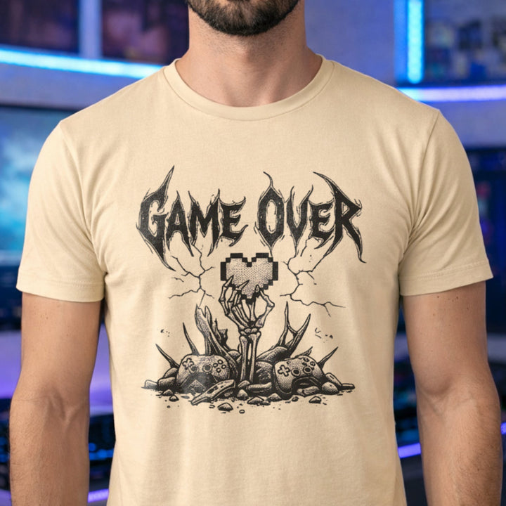 Translation missing: en.Natural gamer t-shirt with heavy metal Game Over text, a skeleton hand holding a pixel heart, and controllers