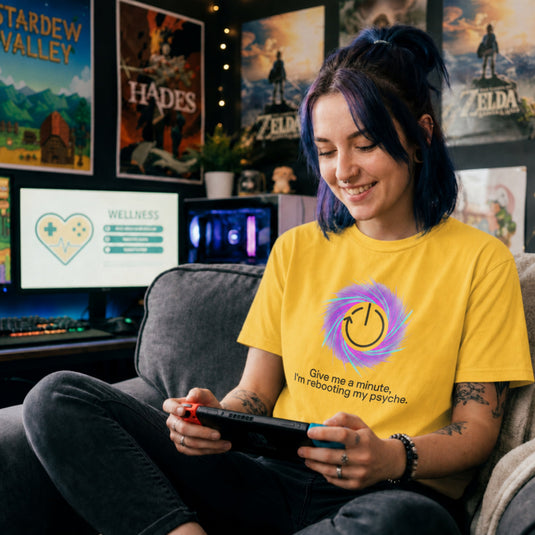 Translation missing: en.Daisy t-shirt graphic with a restart symbol over a purple swirl reading Give me a minute, I'm rebooting my psyche