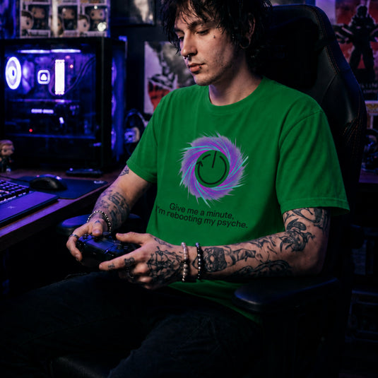 Translation missing: en.Irish green t-shirt graphic with a restart symbol over a purple swirl reading Give me a minute, I'm rebooting my psyche