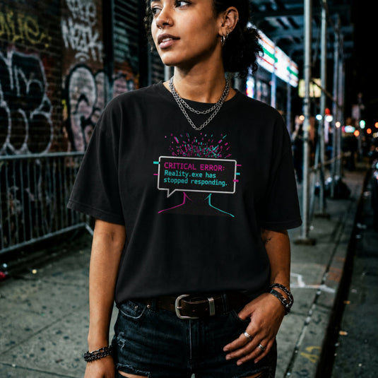 Translation missing: en.Black graphic tee with glitch art text box reading CRITICAL ERROR: Reality.exe has stopped responding