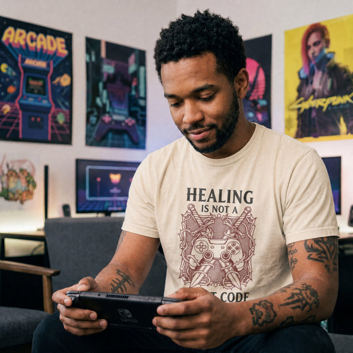 Translation missing: en.Natural gamer tee graphic with crossed swords, controller, and thorns text Healing Is Not A Cheat Code. 
