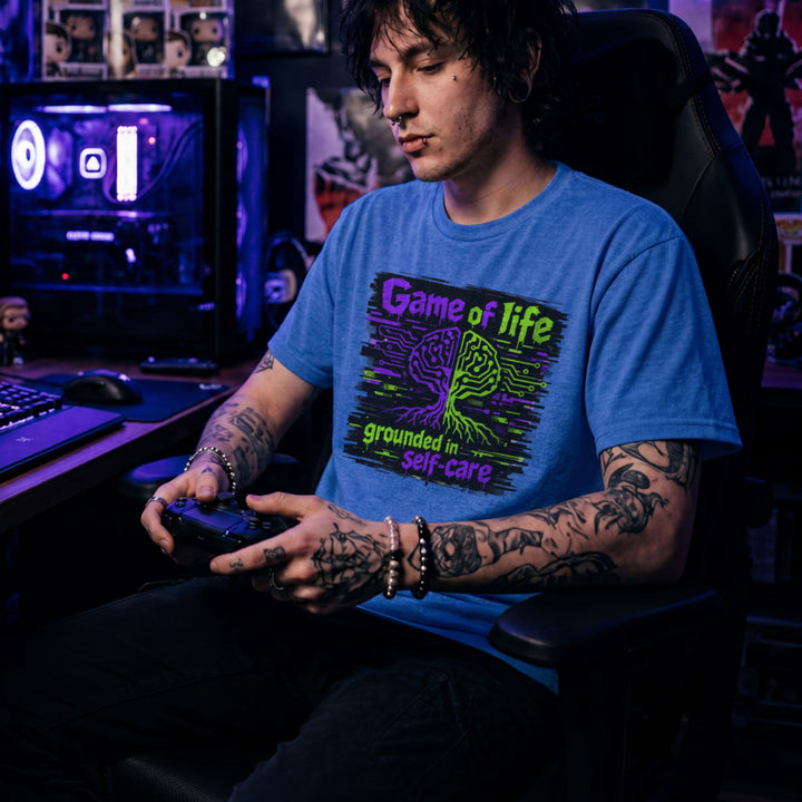 Translation missing: en.Heather royal t-shirt with Game of life grounded in self-care neon graphic showing a circuit board brain tree design