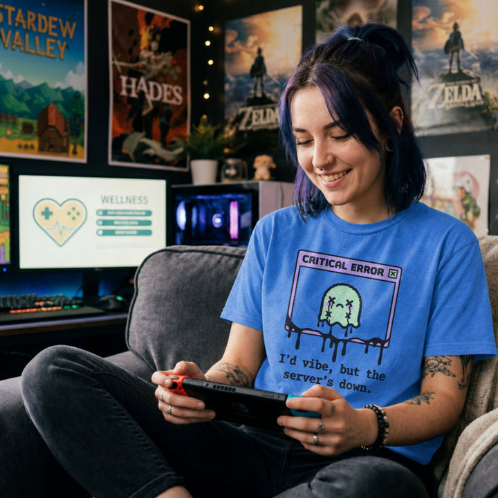 Translation missing: en.Heather Royal cotton tee with graphic critical error box with pixel art character text "I'd vibe but server's down""