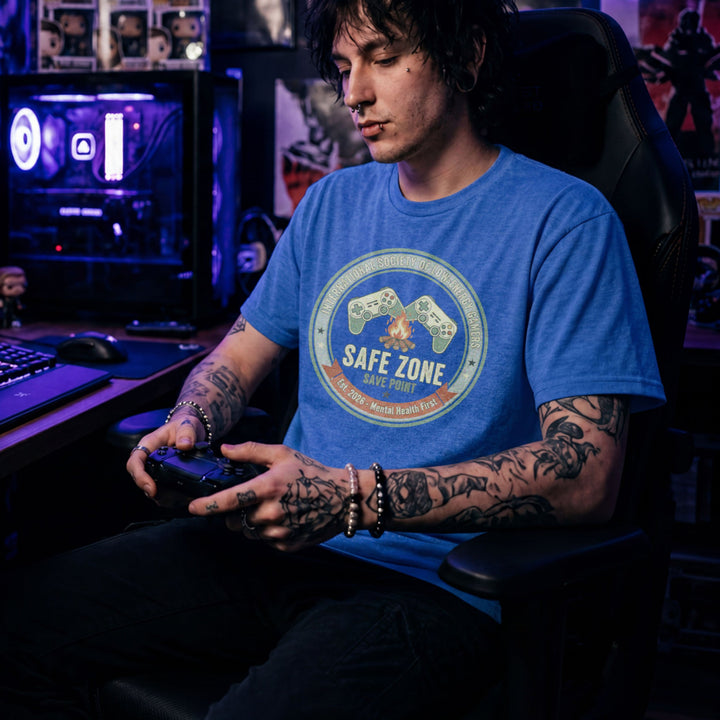 Translation missing: en.Heather royal gamer shirt logo with controllers, a campfire, and text International Society Of Low-Energy Gamers Safe Zone