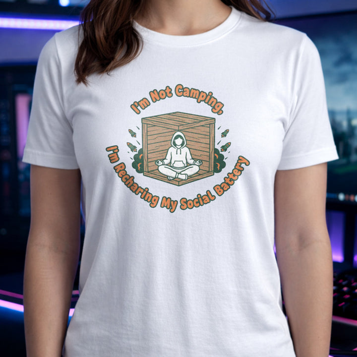 Translation missing: en.White gamer tee graphic with text I'm Not Camping, I'm Recharging My Social Battery and person in a wooden box
