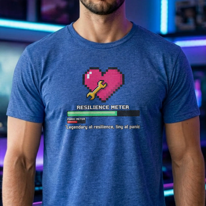 Translation missing: en.Heather royal gamer tee graphic with pixel heart, wrench, loading bar, and text Legendary at resilience, tiny at panic