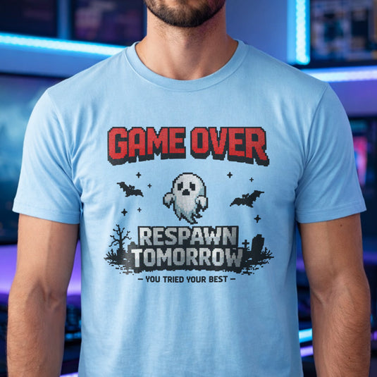 Translation missing: en.Light blue tee with retro pixel text reading Game Over Respawn Tomorrow You Tried Your Best with a ghost and bats