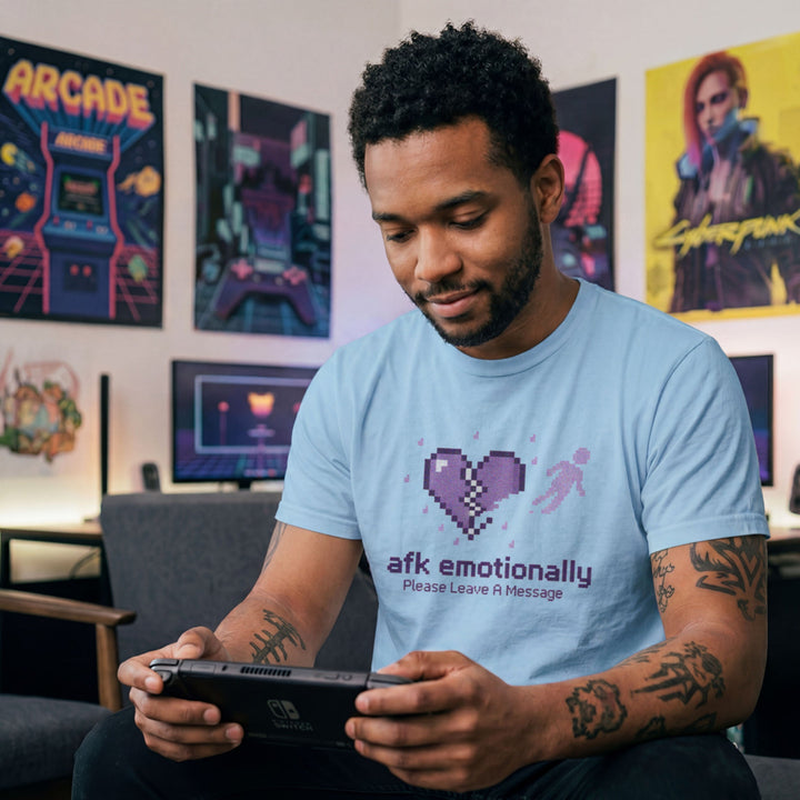 Translation missing: en.Light blue cotton tee with pixel art broken heart and text AFK EMOTIONALLY Please leave a message" 