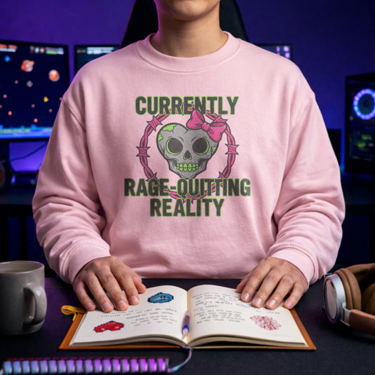 Translation missing: en.Light Pink Crewneck Sweatshirt With Skull Graphic Reading, Currently Rage Quitting Reality