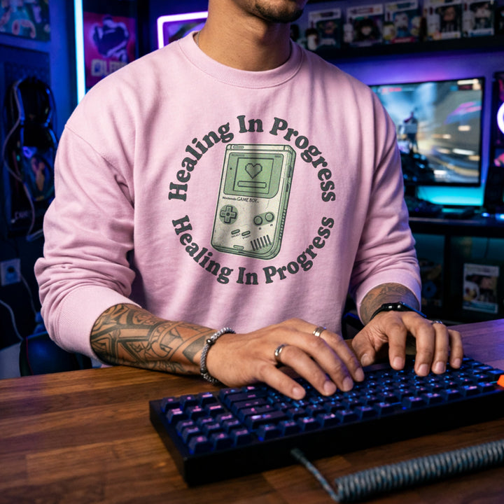 Translation missing: en.Light Pink Crewneck Sweatshirt With Retro Handheld Graphic and Mental Health Quote, Healing In Progress