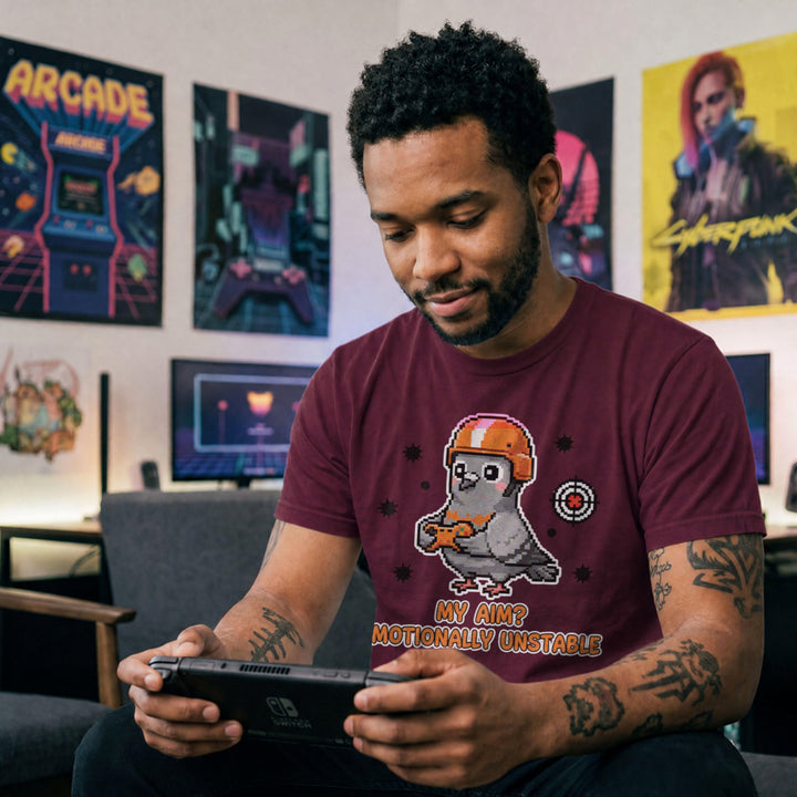 Translation missing: en.Maroon tee with cartoon pigeon gamer graphic and text, "MY AIM? EMOTIONALLY UNSTABLE