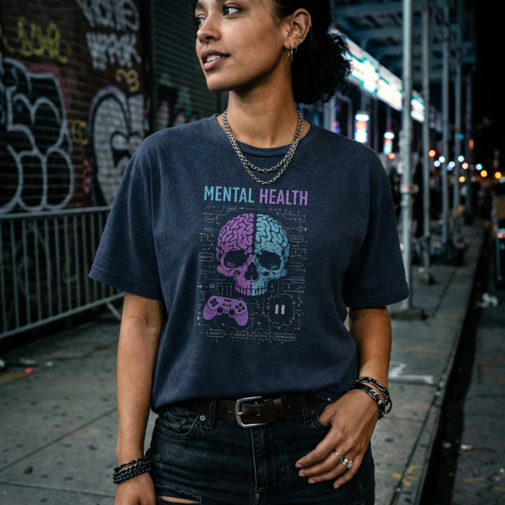 Translation missing: en.Heather navy shirt with text Mental Health above a split purple and blue skull brain graphic, controller, and circuits