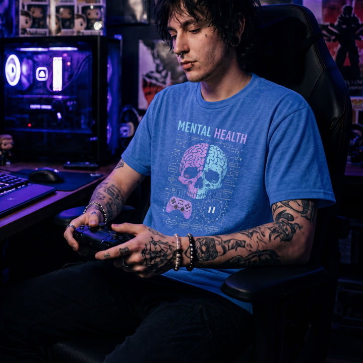 Translation missing: en.Heather royal shirt with text Mental Health above a split purple and blue skull brain graphic, controller, and circuits