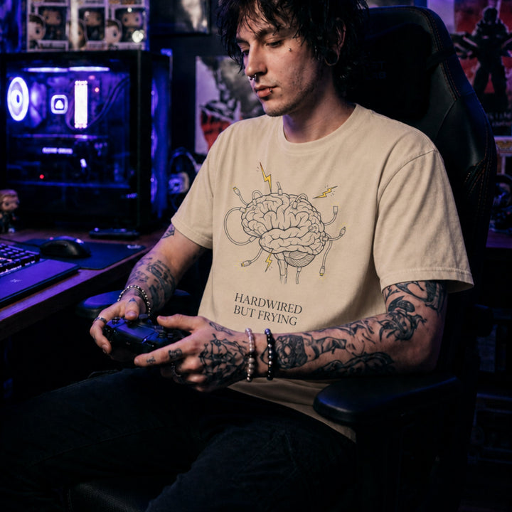 Translation missing: en.Natural cotton tee with overloaded brain with sparking wires graphic and text "HARDWIRED BUT FRYING"