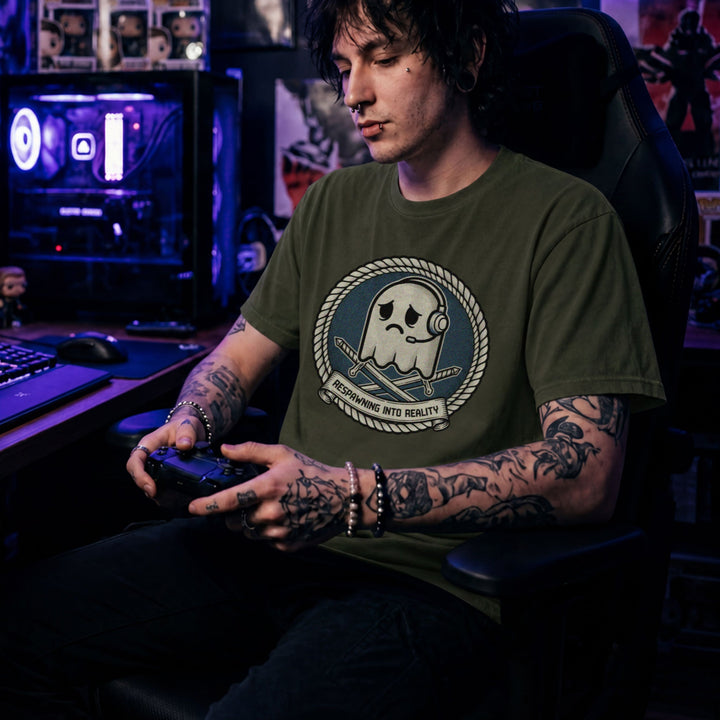 Translation missing: en.Military green t-shirt badge with a sad arcade ghost wearing a headset, crossed swords and Respawning Into Reality text