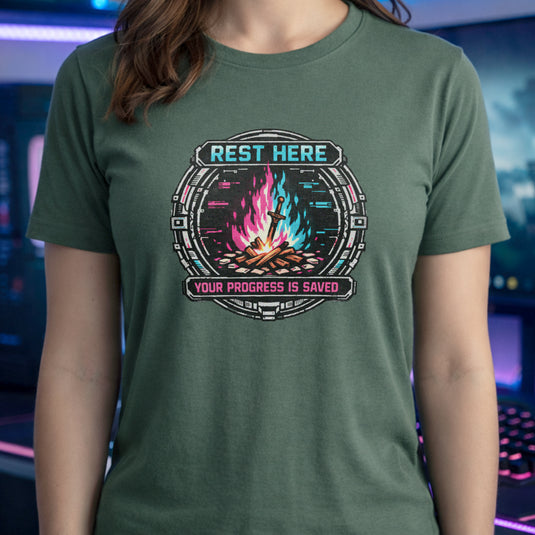 Translation missing: en.Military green shirt with a pink and teal cyber bonfire emblem reading Rest Here, Your Progress Is Saved