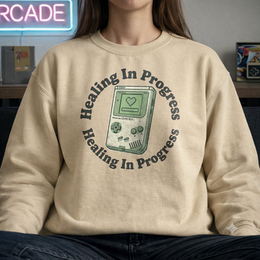 Translation missing: en.Sand Crewneck Sweatshirt With Retro Handheld Graphic and Mental Health Quote, Healing In Progress