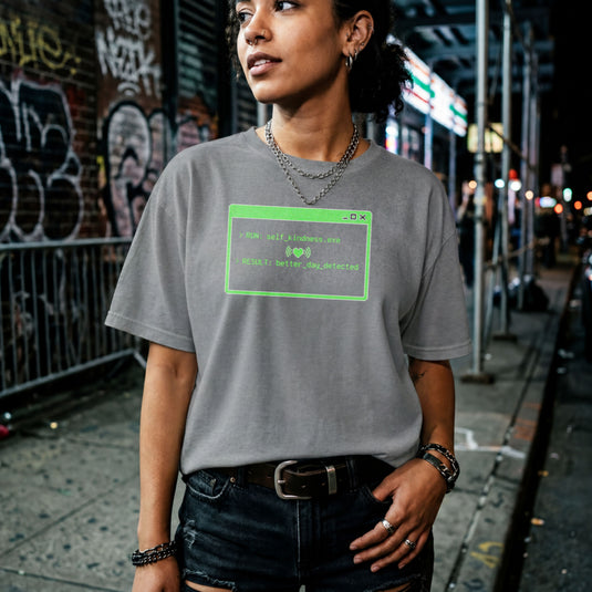 Translation missing: en.Graphite heather shirt with green command prompt window reading RUN self_kindness.exe RESULT better day detected