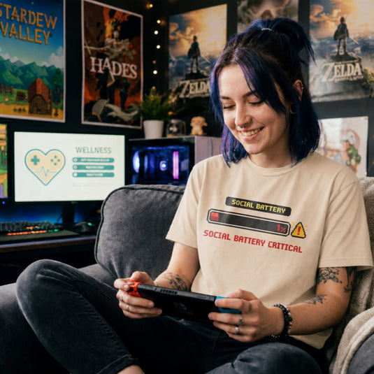 Translation missing: en.Natural shirt with a pixel art one percent loading bar graphic and text reading Social Battery Critical