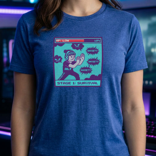 Translation missing: en.Heather royal gamer shirt pixel graphic with low HP health bar and character fighting anxiety bubbles reading STAGE 1: SURVIVAL