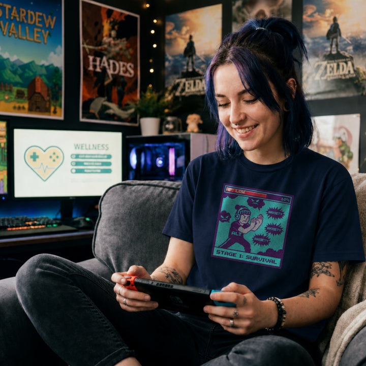 Translation missing: en.Navy gamer shirt pixel graphic with low HP health bar and character fighting anxiety bubbles reading STAGE 1: SURVIVAL