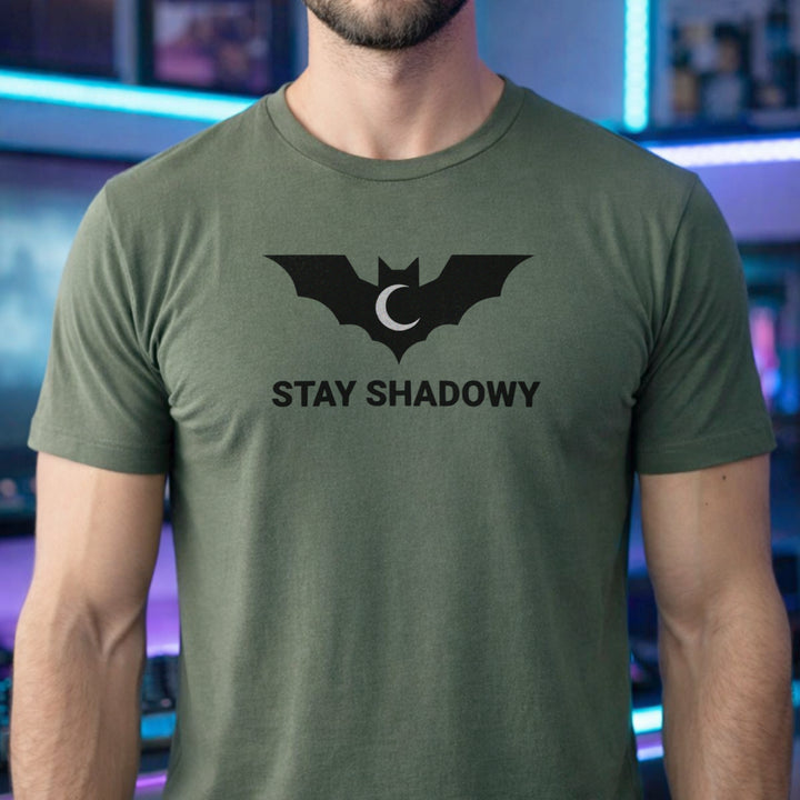 Translation missing: en.Military green gamer mental health graphic tee featuring a black bat and crescent moon with Stay Shadowy text