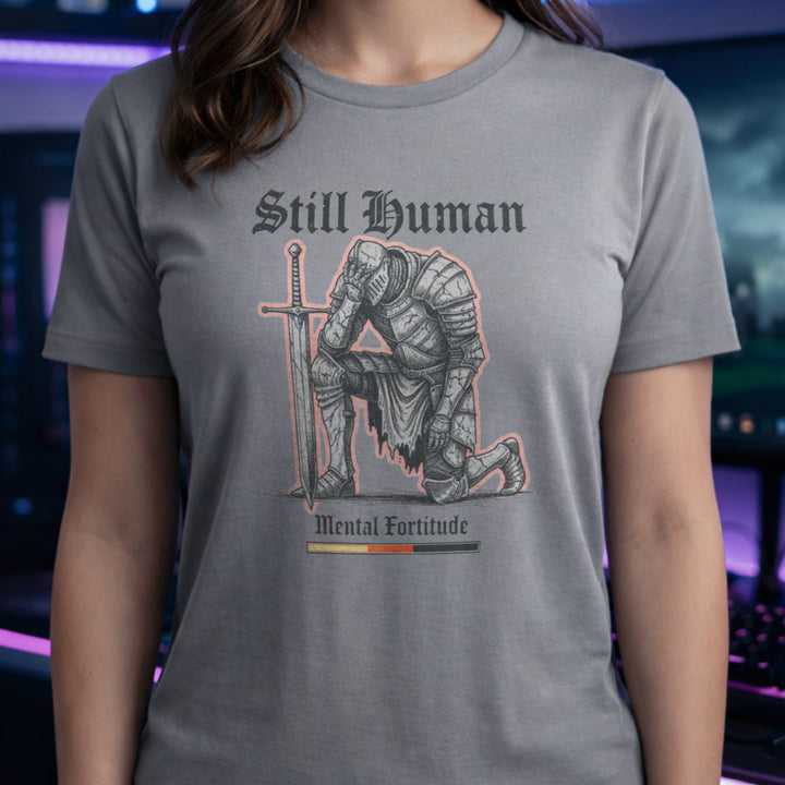 Translation missing: en.Sports grey  t-shirt graphic showing a kneeling knight holding his head with text Still Human Mental Fortitude
