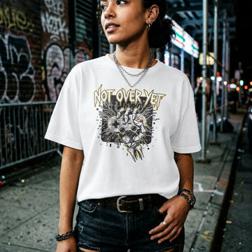 Translation missing: en.White cotton tee with bone hand holding gamepad graphic text 'Not Over Yet'