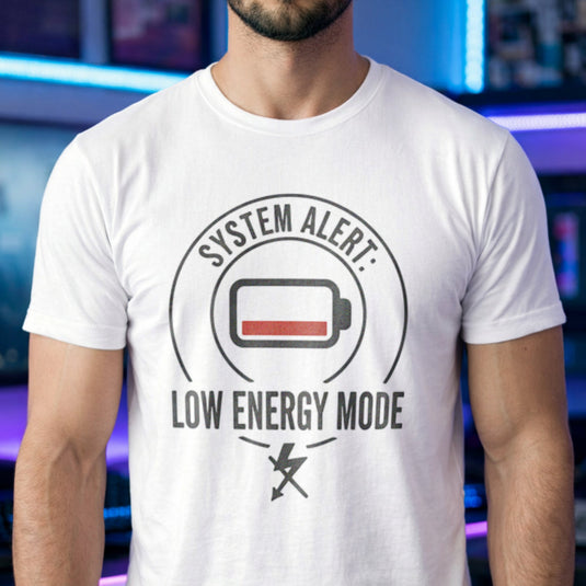 Translation missing: en. White cotton t-shirt with a graphic low battery icon design and text 'SYSTEM ALERT: LOW ENERGY MODE' 