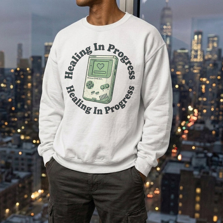 Translation missing: en.White Crewneck Sweatshirt With Retro Handheld Graphic and Mental Health Quote, Healing In Progress